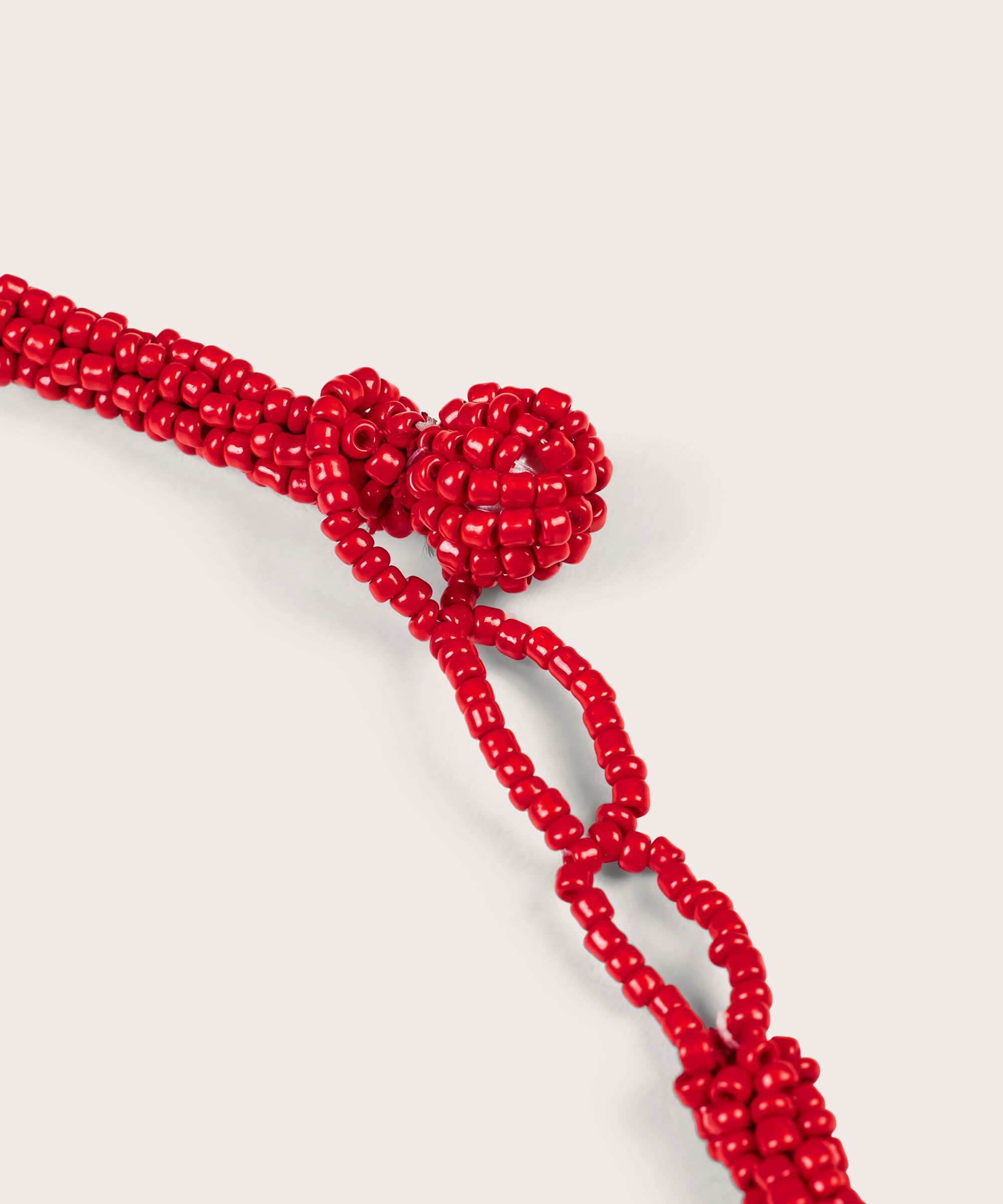 Revila Halskæde, Orange com