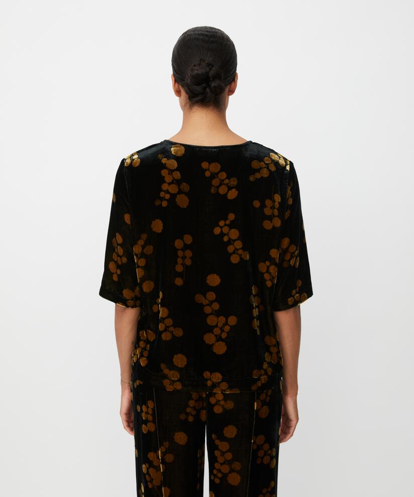Estela Top, Rubber