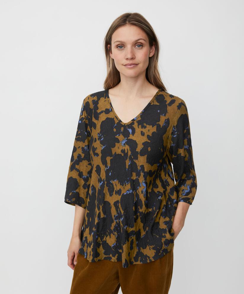 Katacia Top, Breen