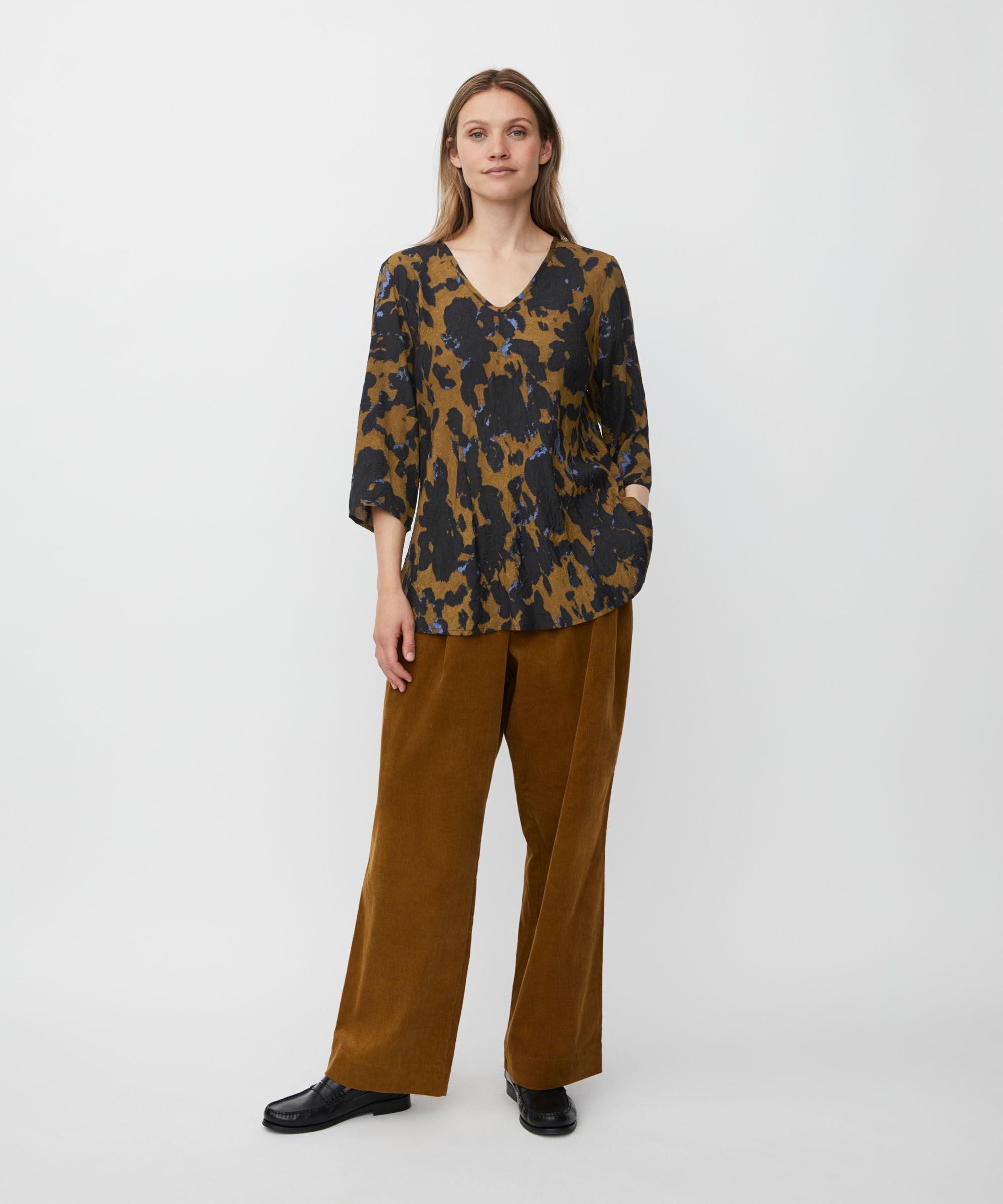 Katacia Top, Breen
