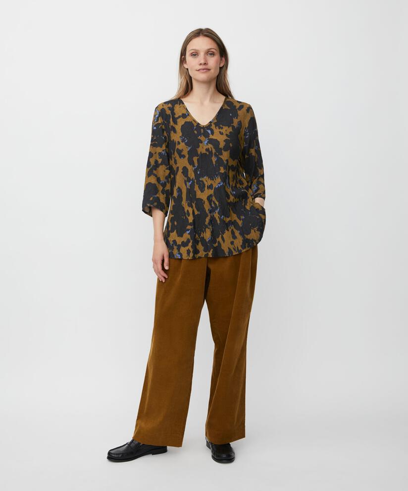 Katacia Top, Breen