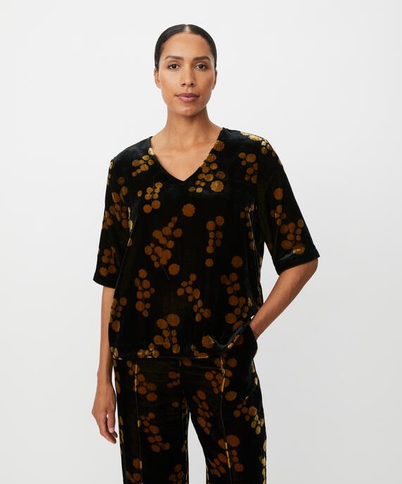 Estela Top, Rubber