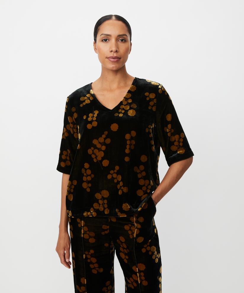 Estela Top, Rubber